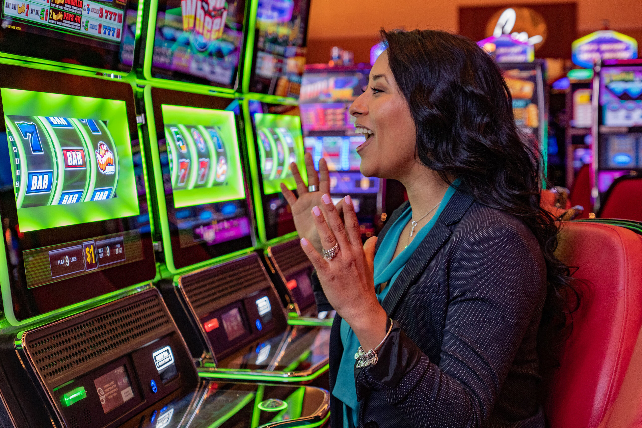 Guest playing slot machine